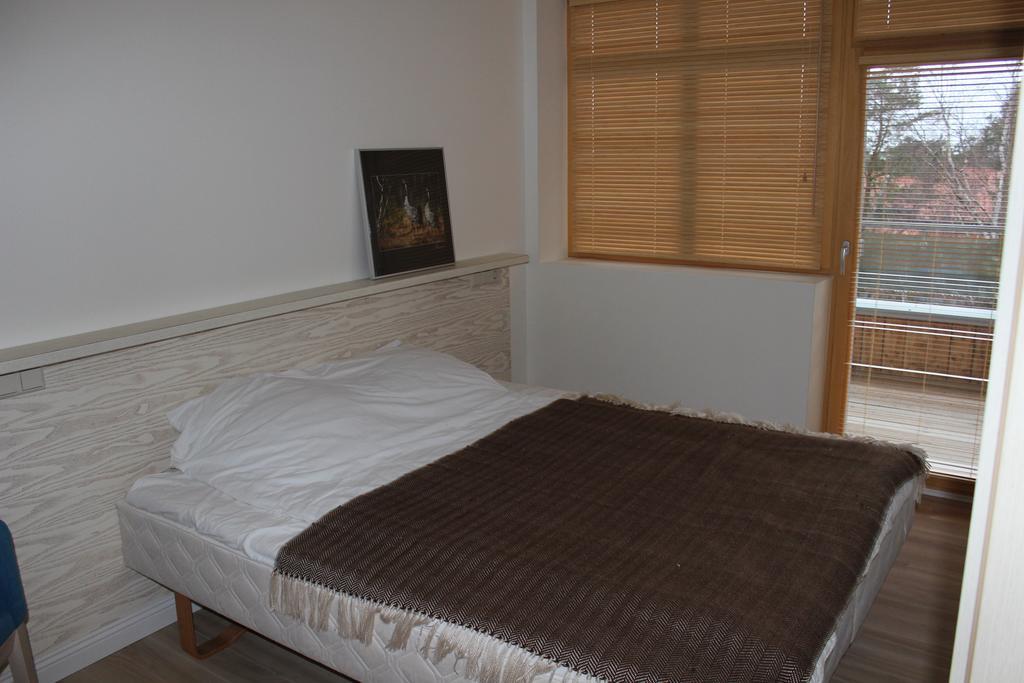 Nidos Apartamentai Rum bild